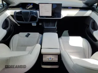 2021 Tesla Model S Plaid с VIN 5YJSA1E66MF453717, выставлен на аукционе Copart как лот 49330355 с пробегом 64 458 миль миль и Списание • Salvage title. История ставок и продаж доступна на DreamBid. Изображение 8.