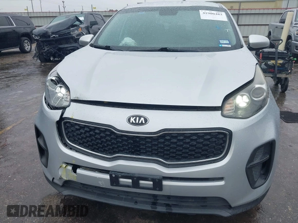 2018 Kia Sportage LX with VIN KNDPM3AC7J7337951, listed as a IAAI auction lot 41900482 with 105,857 mi miles and . Bid and sale history available at carsss.com. Image 12.