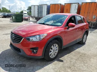 2016 Mazda CX-5 Touring with VIN JM3KE2CY0G0627886, listed as a Copart auction lot 55207054 with 95,884 mi miles and Salvage Title. Bid and sale history available at carsss.com. Image 1.