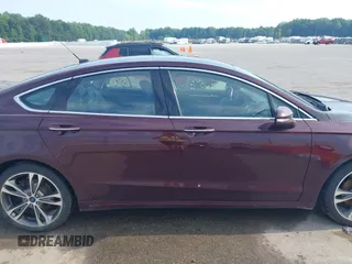 2017 Ford Fusion Titanium z VIN 3FA6P0K94HR271307, wystawiony jako IAAI lot #42595411 z przebiegiem 100 344 mil mil oraz . Historia ofert i sprzedaży dostępna na DreamBid. Obrazek 14.