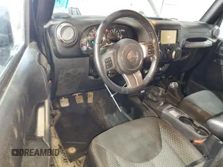 2016 Jeep Wrangler Sport z VIN 1C4GJWAG1GL192158, wystawiony jako Copart lot #53303845 z przebiegiem 99 812 mil mil oraz Szkoda całkowita • Salvage title. Historia ofert i sprzedaży dostępna na DreamBid. Obrazek 8.