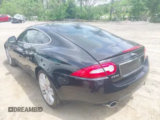 2012 Jaguar XK with VIN SAJWA4FB8CLB47049, listed as a IAAI auction lot 42118136 with 60,953 mi miles. Bid and sale history available at carsss.com. Image 14.