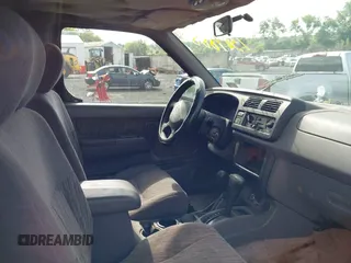 1999 Nissan Frontier XE z VIN 1N6ED26Y6XC301588, wystawiony jako IAAI lot #42703428 z przebiegiem Nie podano mil oraz . Historia ofert i sprzedaży dostępna na DreamBid. Obrazek 5.