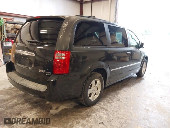 2010 Dodge Grand Caravan SXT with VIN 2D4RN5D19AR433481, listed as a IAAI auction lot 42123049 with 134,882 mi miles and . Bid and sale history available at DreamBid. Image 4.