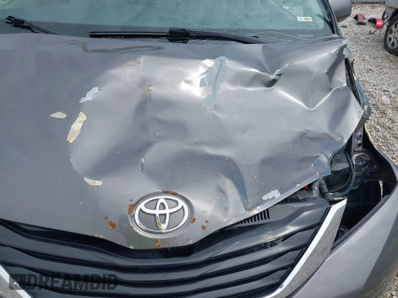 2013 Toyota Sienna LE AAS with VIN 5TDKK3DC0DS301315, listed as a IAAI auction lot 42215454 with 328,507 mi miles and . Bid and sale history available at DreamBid. Image 20.