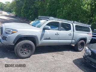 2021 Toyota Tacoma SR5 with VIN 3TMDZ5BN3MM112338, listed as a IAAI auction lot 42241704 with 81,346 mi miles and . Bid and sale history available at DreamBid. Image 14.