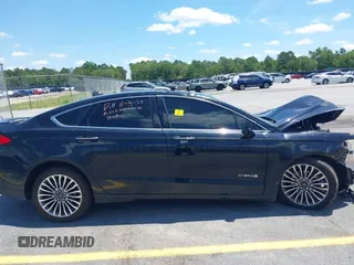 2018 Ford Fusion Titanium with VIN 3FA6P0RU8JR101306, listed as a IAAI auction lot 42542847 with 193,874 mi miles and . Bid and sale history available at DreamBid. Image 13.