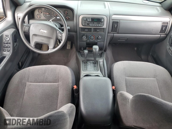 2001 Jeep Grand Cherokee Laredo with VIN 1J4GW48S91C580921, listed as a Copart auction lot 59005625 with 163,827 mi miles and Salvage title. Bid and sale history available at DreamBid. Image 8.