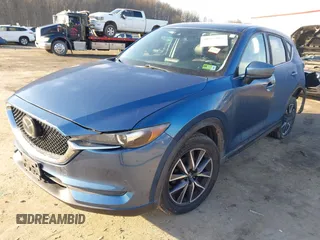 2018 Mazda CX-5 Touring z VIN JM3KFBCM2J0461954, wystawiony jako IAAI lot #41655865 z przebiegiem 129 333 mil mil oraz . Historia ofert i sprzedaży dostępna na DreamBid. Obrazek 19.