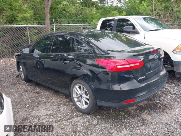 2018 Ford Focus SE with VIN 1FADP3F24JL248653, listed as a IAAI auction lot 42416377 with 113,856 mi miles and . Bid and sale history available at DreamBid. Image 3.