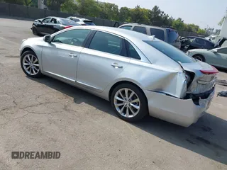 2014 Cadillac XTS Luxury with VIN 2G61N5S30E9294994, listed as a IAAI auction lot 42617654 with 159,573 mi miles and . Bid and sale history available at DreamBid. Image 3.