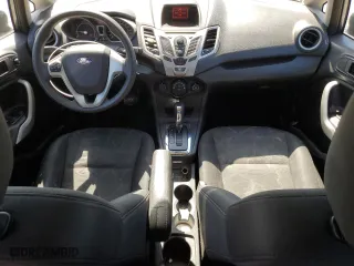 2012 Ford Fiesta SE with VIN 3FADP4BJ7CM157588, listed as a Copart auction lot 52411945 with 124,989 mi miles and Salvage Title. Bid and sale history available at carsss.com. Image 8.
