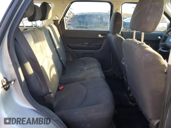 2010 Mazda Tribute Grand Touring with VIN 4F2CY0C74AKM03659, listed as a Copart auction lot 84494254 with 160,177 mi miles and Salvage Title. Bid and sale history available at carsss.com. Image 11.