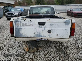 1990 Nissan Frontier with VIN 1N6SD16S9LC404281, listed as a Copart auction lot 84214904 with 279,270 mi miles and Salvage title. Bid and sale history available at DreamBid. Image 6.