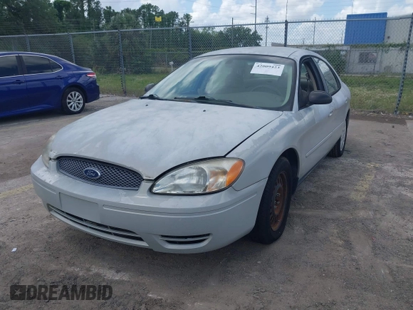 2006 Ford Taurus SE with VIN 1FAFP53U56A209213, listed as a IAAI auction lot 42009423 with 118,083 mi miles. Bid and sale history available at carsss.com. Image 2.