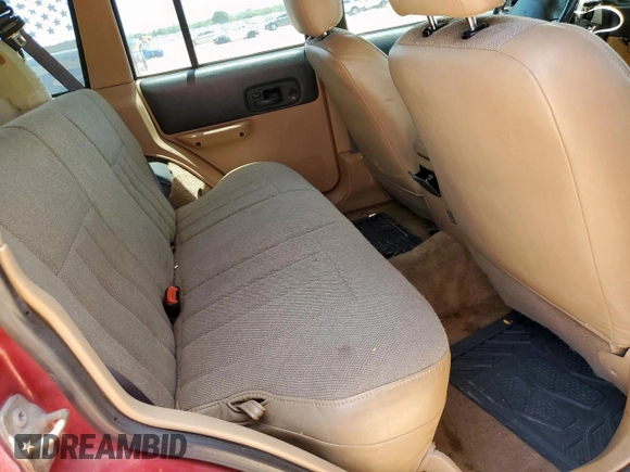 1999 Jeep Cherokee Sport с VIN 1J4FT68S5XL675839, выставлен на аукционе Copart как лот 65230005 с пробегом 204 102 миль миль и Списание • Salvage title. История ставок и продаж доступна на DreamBid. Изображение 11.