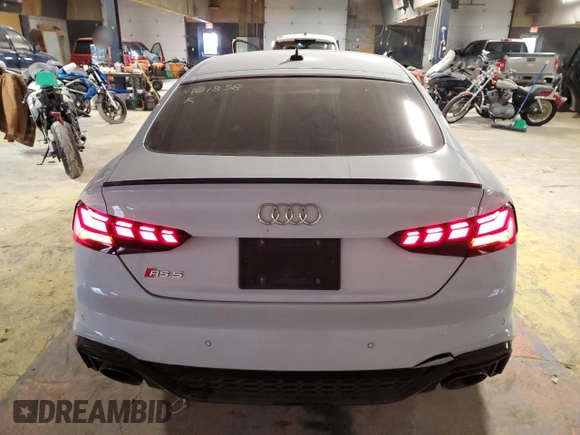 2023 Audi RS 5 Sportback z VIN WUAAWCF5XPA901858, wystawiony jako Copart lot #42140035 z przebiegiem Nie podano mil oraz Szkoda całkowita • Salvage title. Historia ofert i sprzedaży dostępna na DreamBid. Obrazek 6.