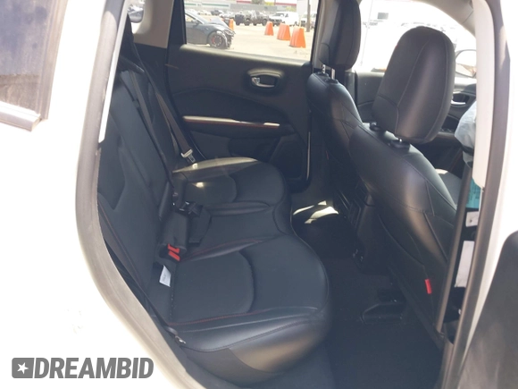 2020 Jeep Compass Trailhawk z VIN 3C4NJDDB5LT248662, wystawiony jako IAAI lot #42574553 z przebiegiem 28 118 mil mil oraz . Historia ofert i sprzedaży dostępna na DreamBid. Obrazek 8.