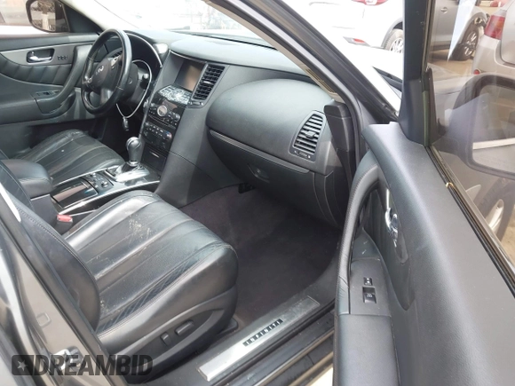 2014 Infiniti QX70 with VIN JN8CS1MU8EM450428, listed as a IAAI auction lot 42233727 with 88,342 mi miles and . Bid and sale history available at DreamBid. Image 5.