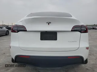2023 Tesla Model Y Long Range with VIN 7SAYGDEE2PF860135, listed as a Copart auction lot 50380975 with 25,334 mi miles and Salvage Title. Bid and sale history available at DreamBid. Image 6.
