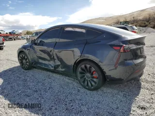 2024 Tesla Model Y Performance z VIN 7SAYGDEF6RF166365, wystawiony jako Copart lot #48885585 z przebiegiem Nie podano mil oraz Szkoda całkowita • Salvage title. Historia ofert i sprzedaży dostępna na DreamBid. Obrazek 2.