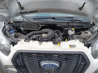 2023 Ford Transit Cargo z VIN 1FTBF4U80PKA47025, wystawiony jako IAAI lot #41715521 z przebiegiem 104 952 mil mil oraz . Historia ofert i sprzedaży dostępna na DreamBid. Obrazek 10.