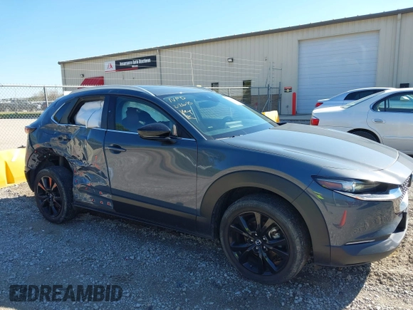 2023 Mazda CX-30 2.5 S Carbon Edition with VIN 3MVDMBCM5PM528946, listed as a IAAI auction lot 41882936 with 62,815 mi miles. Bid and sale history available at carsss.com. Image 6.