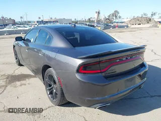 2016 Dodge Charger SXT with VIN 2C3CDXHG6GH327461, listed as a IAAI auction lot 41955412 with 124,775 mi miles and . Bid and sale history available at carsss.com. Image 3.