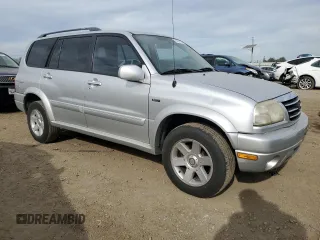 2003 Suzuki XL7 Touring z VIN JS3TX92V934111781, wystawiony jako Copart lot #47422395 z przebiegiem 248 137 mil mil oraz Czysty tytuł • Clean title. Historia ofert i sprzedaży dostępna na DreamBid. Obrazek 4.