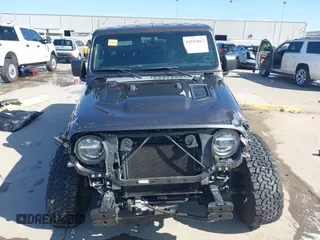 2020 Jeep Wrangler Unlimited Rubicon z VIN 1C4HJXFN0LW300344, wystawiony jako IAAI lot #41943662 z przebiegiem 59 051 mil mil oraz . Historia ofert i sprzedaży dostępna na DreamBid. Obrazek 12.