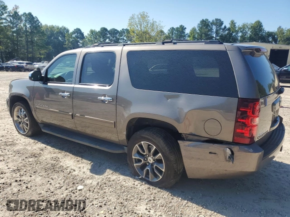 2013 Chevrolet Suburban LS with VIN 1GNSCHE04DR274687, listed as a Copart auction lot 67646174 with 184,268 mi miles and Salvage Title. Bid and sale history available at carsss.com. Image 2.