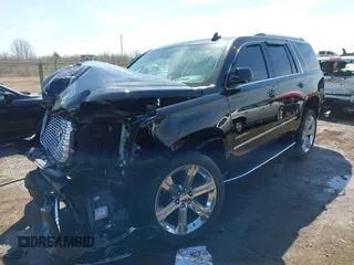 2017 GMC Yukon Denali with VIN 1GKS2CKJ0HR185365, listed as a IAAI auction lot 41856187 with 107,641 mi miles. Bid and sale history available at carsss.com. Image 2.