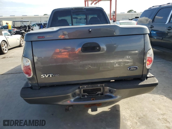2003 Ford F-150 Lightning with VIN 2FTRF07303CA45572, listed as a Copart auction lot 74384694 with 0 mi miles and Salvage Title. Bid and sale history available at carsss.com. Image 6.