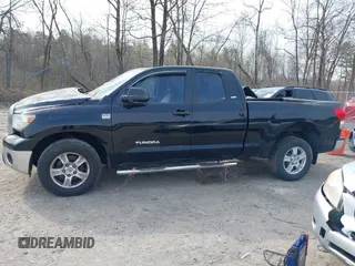 2007 Toyota Tundra SR5 z VIN 5TFBT54117X005726, wystawiony jako IAAI lot #42105716 z przebiegiem 84 828 mil mil oraz . Historia ofert i sprzedaży dostępna na DreamBid. Obrazek 14.