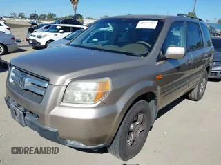 2006 Honda Pilot EX with VIN 5FNYF28416B017534, listed as a IAAI auction lot 41656789 with 241,343 mi miles and . Bid and sale history available at DreamBid. Image 22.