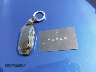 2021 Tesla Model S Long Range with VIN 5YJSA1E51MF442874, listed as a IAAI auction lot 39406495 with 36,127 mi miles and . Bid and sale history available at DreamBid. Image 11.