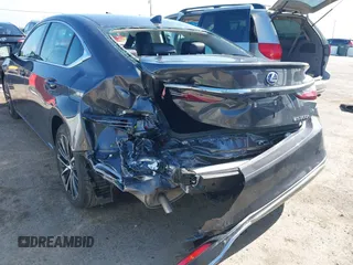 2022 Lexus ES 300h with VIN 58ADA1C15NU026266, listed as a IAAI auction lot 42121610 with 18,059 mi miles and . Bid and sale history available at DreamBid. Image 6.