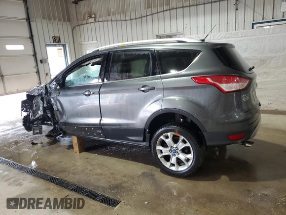 2015 Ford Escape Titanium with VIN 1FMCU9J93FUC86300, listed as a Copart auction lot 60852895 with 156,296 mi miles and Salvage title. Bid and sale history available at DreamBid. Image 2.