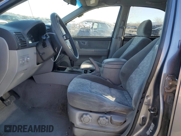 2005 Kia Sorento LX with VIN KNDJD733X55410306, listed as a Copart auction lot 45815005 with 104,153 mi miles and Salvage Title. Bid and sale history available at DreamBid. Image 7.
