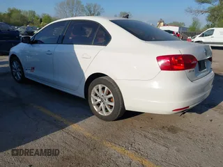 2012 Volkswagen Jetta Sedan SE w/Convenience & Sunroof with VIN 3VWDX7AJ4CM386885, listed as a IAAI auction lot 42052411 with 328,232 mi miles. Bid and sale history available at carsss.com. Image 3.
