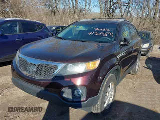 2011 Kia Sorento LX with VIN 5XYKT4A19BG164164, listed as a IAAI auction lot 41765891 with 144,684 mi miles. Bid and sale history available at carsss.com. Image 2.