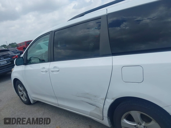 2014 Toyota Sienna LE AAS with VIN 5TDKK3DC0ES525654, listed as a IAAI auction lot 42153582 with 71,258 mi miles and . Bid and sale history available at carsss.com. Image 14.