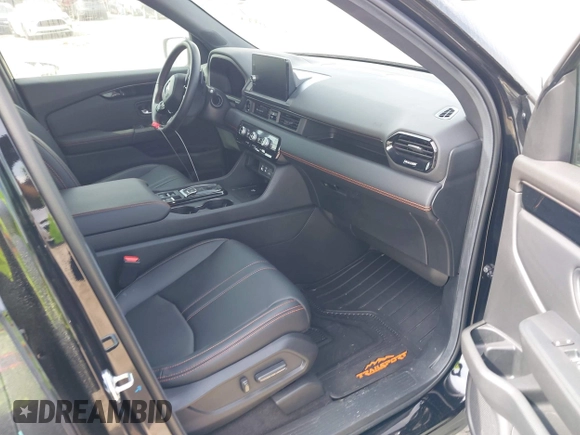 2025 Honda Pilot TrailSport with VIN 5FNYG1H61SB026477, listed as a IAAI auction lot 41471719 with 12,624 mi miles and . Bid and sale history available at DreamBid. Image 5.