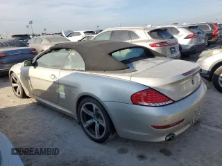 2008 BMW 6 Series 650i with VIN WBAEB53568CX60574, listed as a Copart auction lot 75687704 with 0 mi miles and Salvage Title. Bid and sale history available at carsss.com. Image 2.
