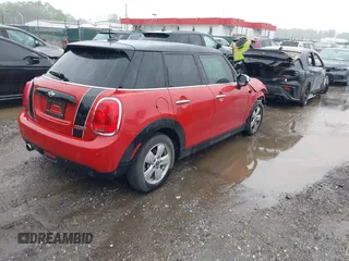 2017 MINI Hardtop 4 Door Cooper with VIN WMWXU1C58H2E18094, listed as a IAAI auction lot 42312473 with 50,482 mi miles and . Bid and sale history available at DreamBid. Image 4.