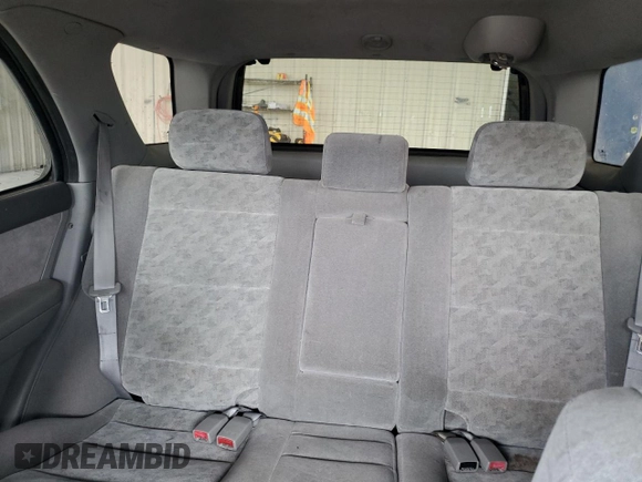 2005 Kia Sorento LX z VIN KNDJC733855449656, wystawiony jako Copart lot #52234685 z przebiegiem 114 398 mil mil oraz Szkoda całkowita • Salvage title. Historia ofert i sprzedaży dostępna na DreamBid. Obrazek 10.