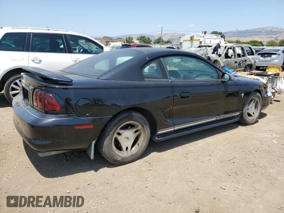 1997 Ford Mustang with VIN 1FALP4048VF172130, listed as a Copart auction lot 59790275 with 125,336 mi miles and Salvage title. Bid and sale history available at DreamBid. Image 3.