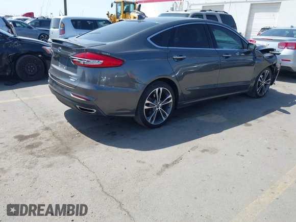 2019 Ford Fusion Titanium with VIN 3FA6P0D90KR109985, listed as a IAAI auction lot 41993329 with Not provided miles and . Bid and sale history available at DreamBid. Image 4.