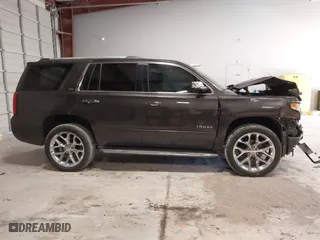 2015 Chevrolet Tahoe LTZ with VIN 1GNSCCKC2FR114442, listed as a IAAI auction lot 41629816 with 152,768 mi miles. Bid and sale history available at carsss.com. Image 13.