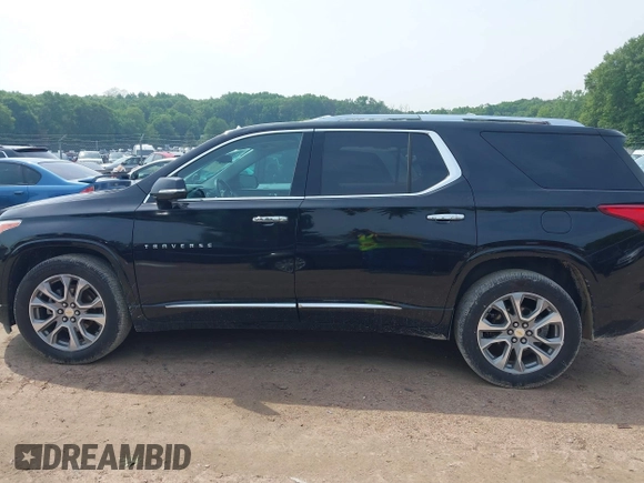 2019 Chevrolet Traverse Premier with VIN 1GNEVKKW1KJ282531, listed as a IAAI auction lot 42408361 with 95,464 mi miles and . Bid and sale history available at DreamBid. Image 14.